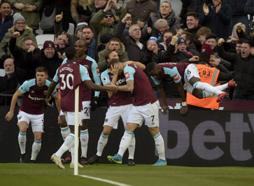 The Hammers celebrate Arnautovic's winner