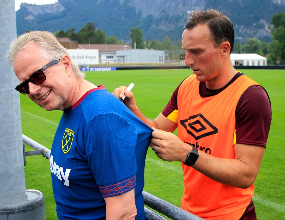 Mark Noble signs an autograph for a supporter in Bad Ragaz