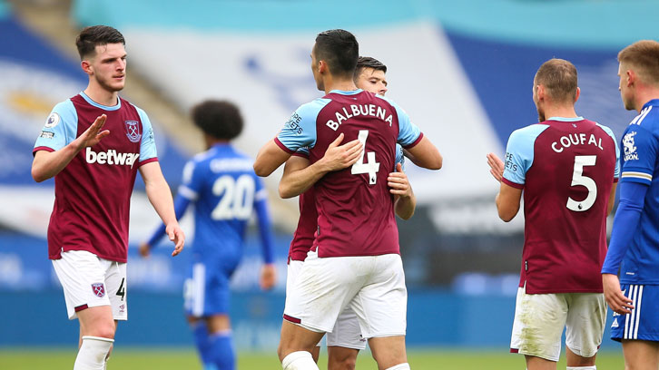 The players celebrate victory at Leicester