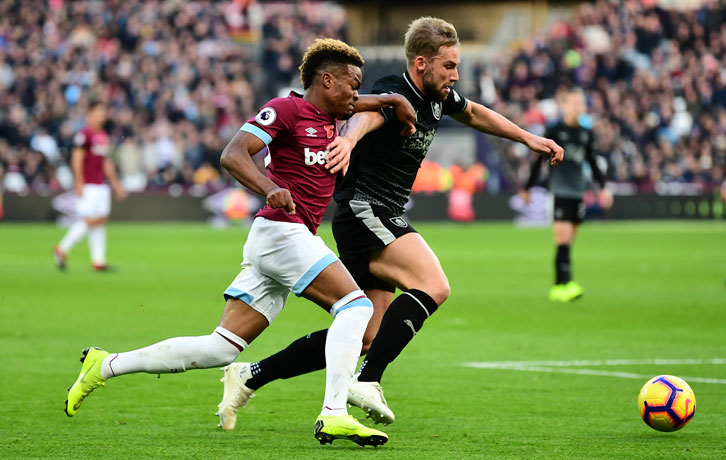 Grady Diangana takes on Burnley's Charlie Taylor