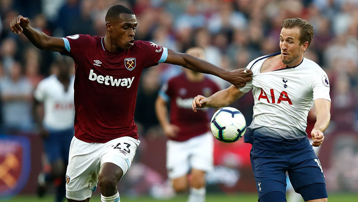 Issa Diop gets to grips with Harry Kane