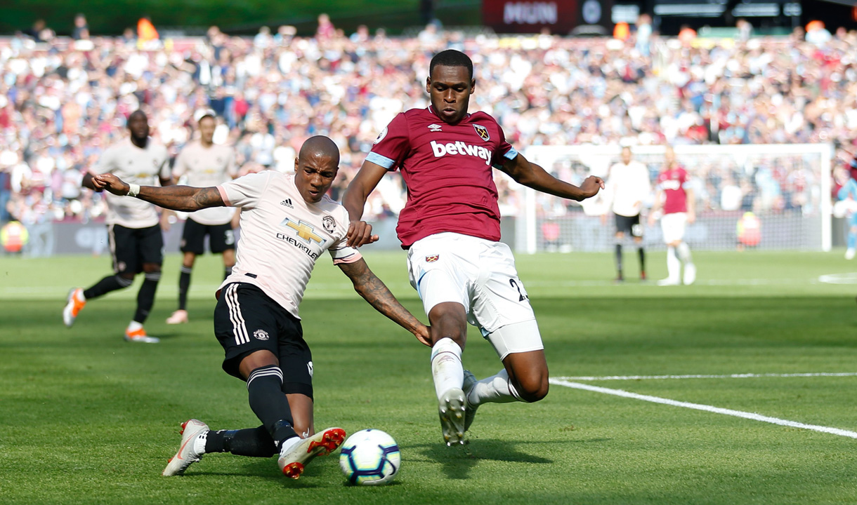 Issa Diop challenges Ashley Young