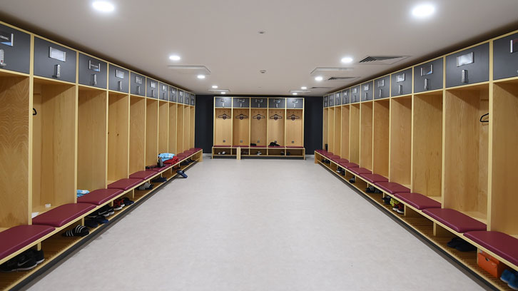 The first-team dressing room at Rush Green