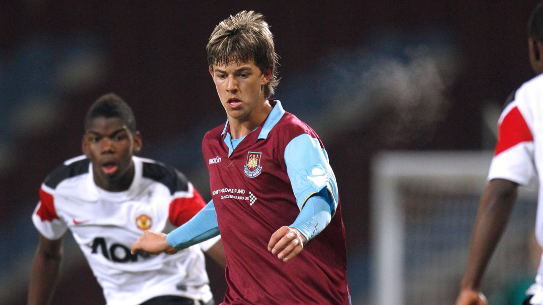 Dylan Tombides in action against Paul Pogba