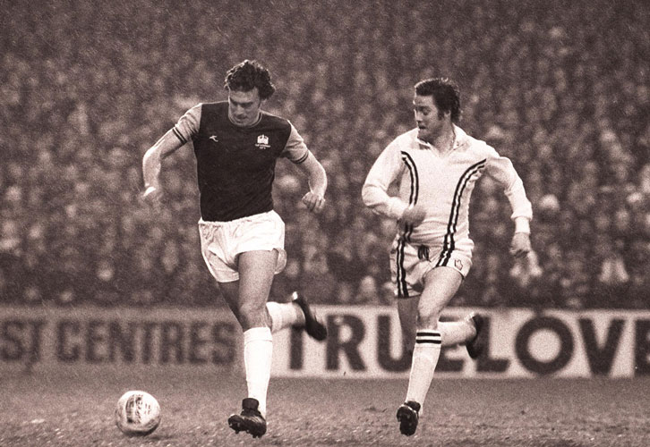 Trevor Brooking gliding across the Boleyn Ground mud