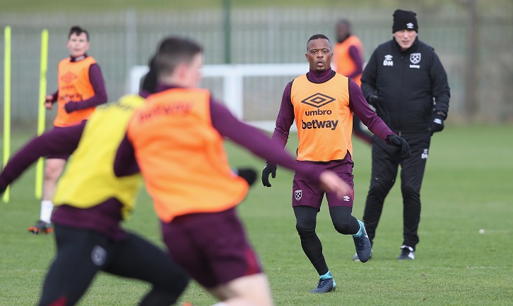 Patrice Evra trains under the guidance of manager David Moyes