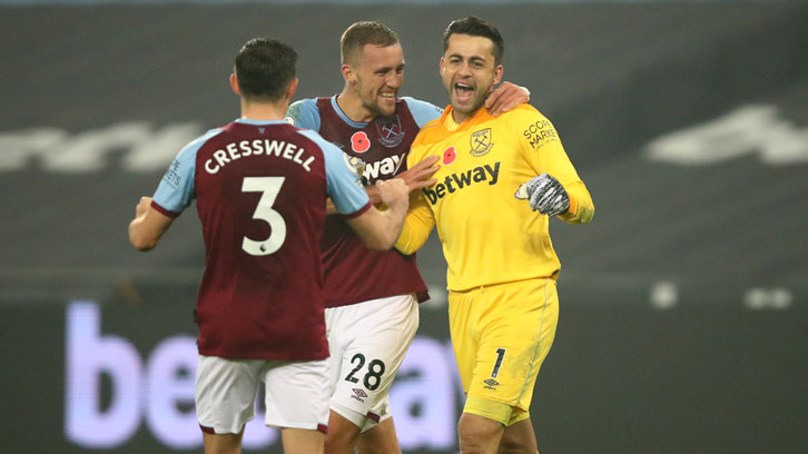 Lukasz Fabianski celebrates his penalty save