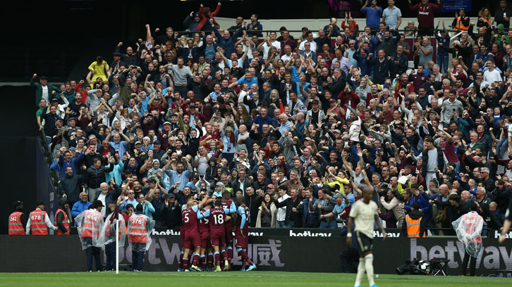 Fans celebrate at London Stadium