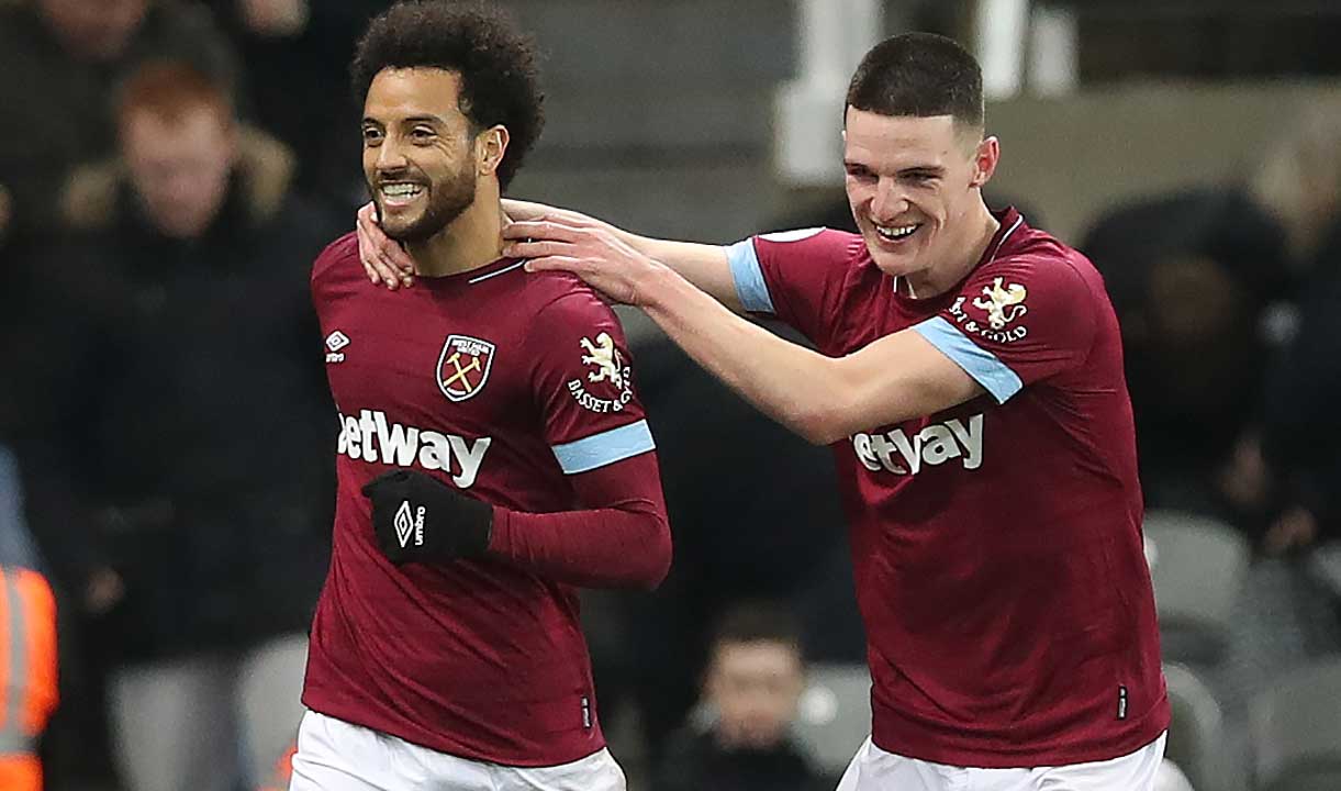 Felipe Anderson and Declan Rice celebrate a goal at Newcastle