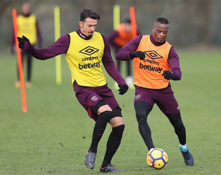 Jose Fonte and Patrice Evra in training at Rush Green