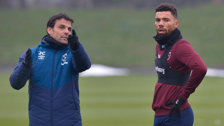 Ryan Fredericks takes instruction from coach Jose Cabello