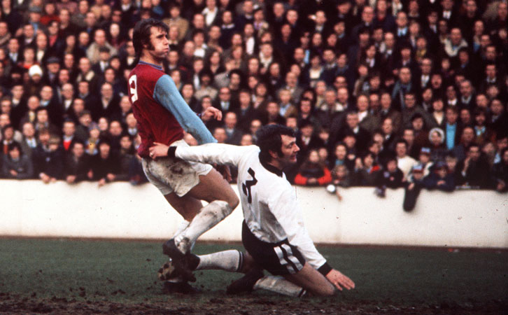 Geoff Hurst scores one of his three goals against Hereford United in 1972