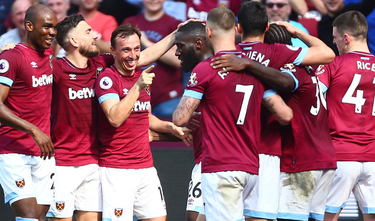 Mark Noble celebrates Michail Antonio's goal against Leicester