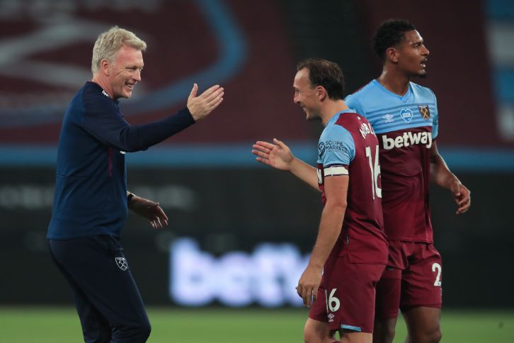 Mark Noble celebrates victory with David Moyes