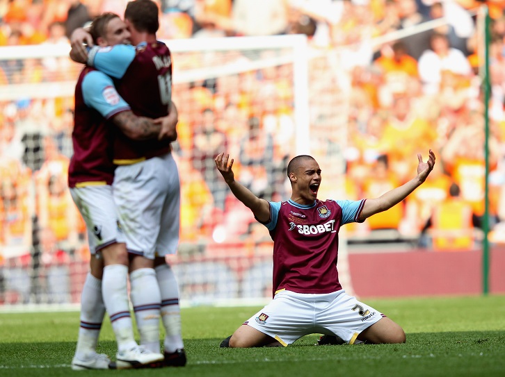 Winston Reid celebrates winning promotion at Wembley in 2012