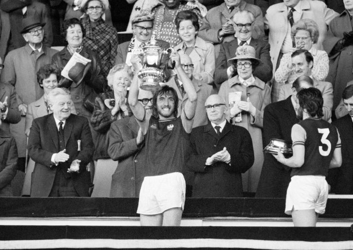 Billy Bonds lifts the FA Cup in 1975 