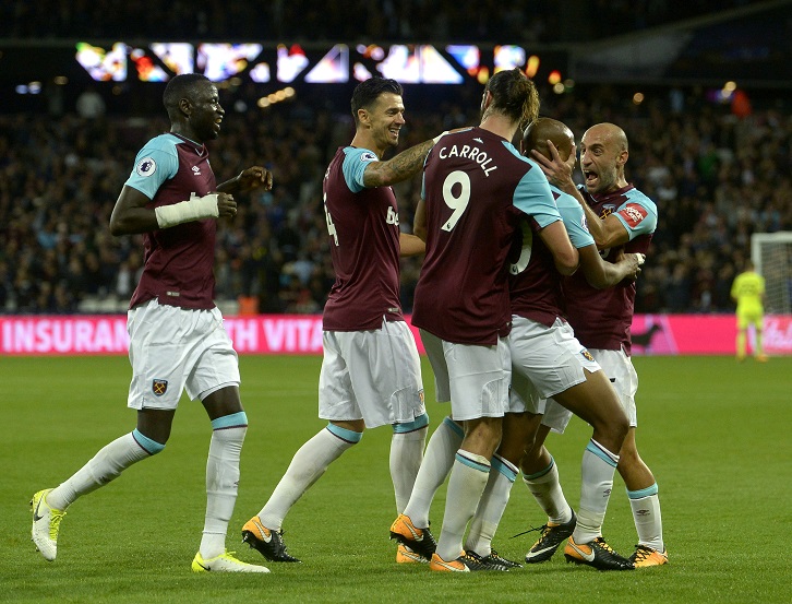 Andre Ayew celebrates after scoring West Ham United's second goal against Huddersfield Town