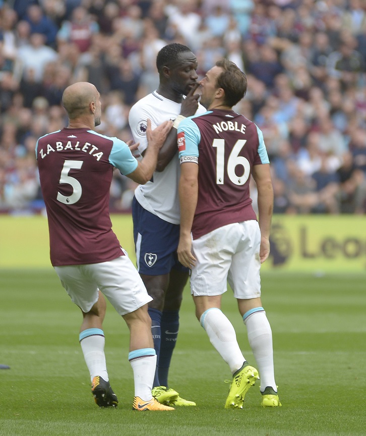 Mark Noble goes toe to toe with Tottenham Hotspur's Moussa Sissoko