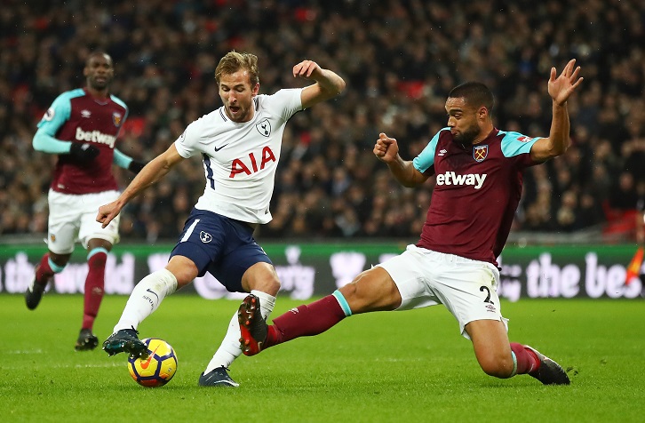 Winston Reid makes a block to deny Harry Kane