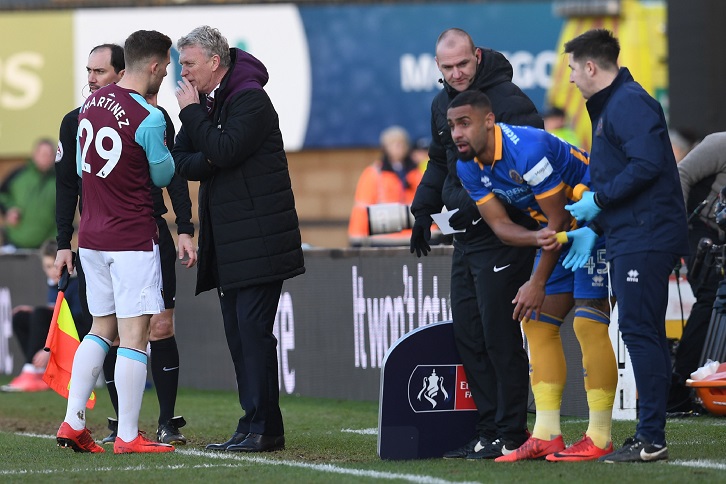 Debutant Toni Martinez receives final instructions from manager David Moyes