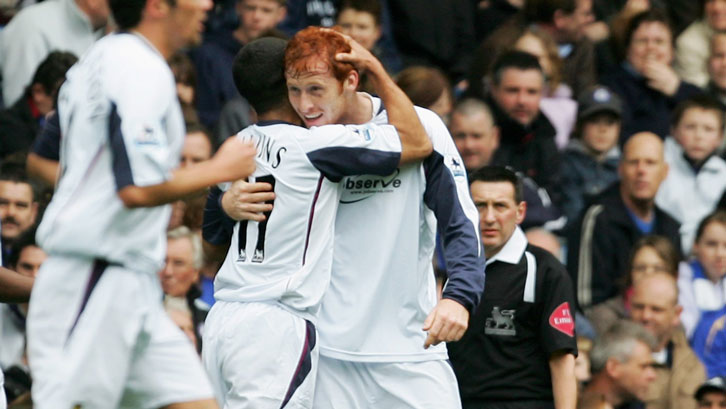 James Collins celebrates scoring against Chelsea at Stamford Bridge