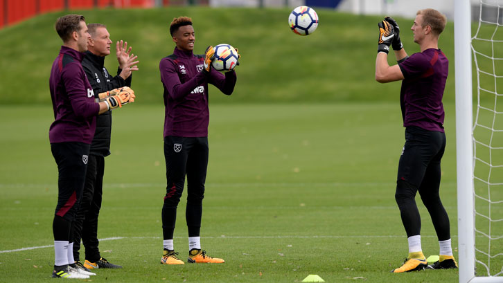 Chris Woods works with Adrian, Nathan Trott and Joe Hart in training