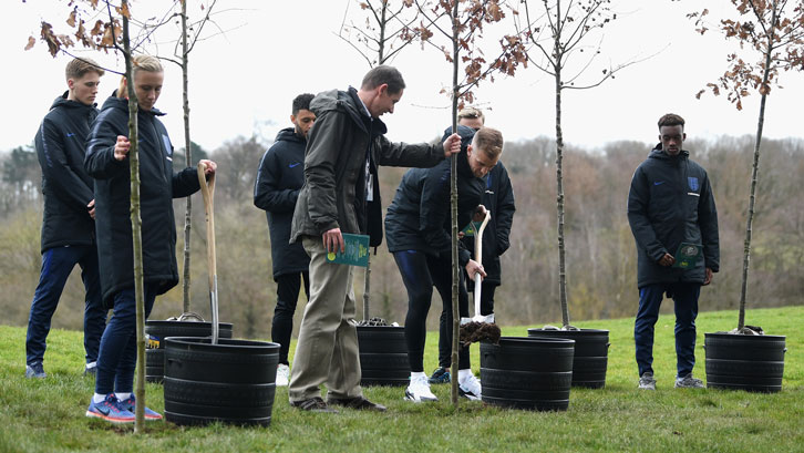 Joe Hart plants a tree in memory of England players who were killed during the First World War