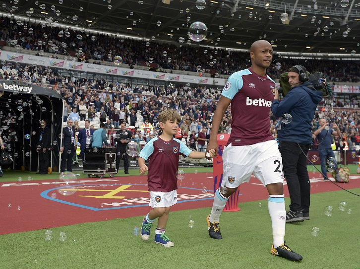 Duarte Buzio takes to the pitch with Andre Ayew