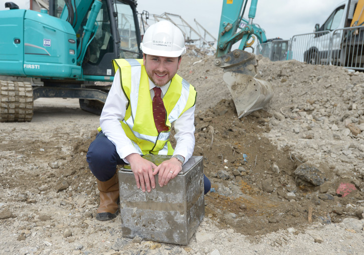 West Ham United’s Supporter Services Manager Jake Heath unearths the original Bobby Moore time capsule during the redevelopment of the Boleyn Ground in June 2017