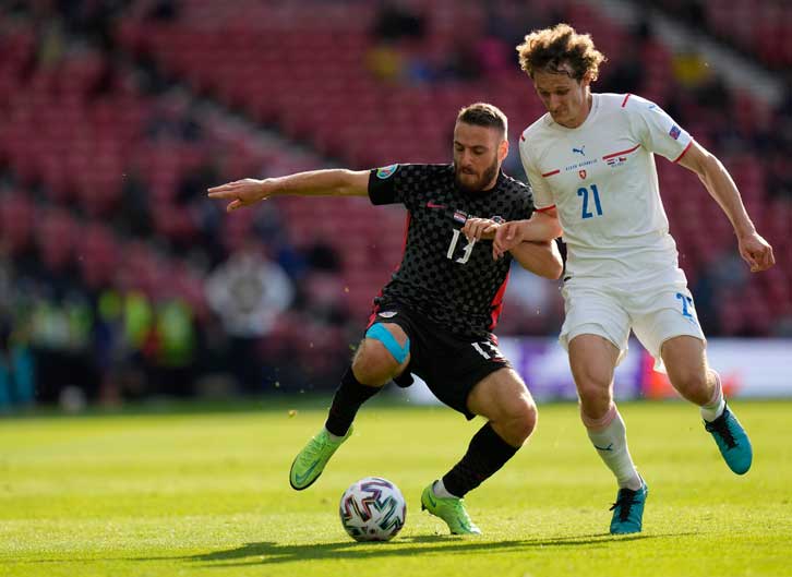 Alex Kral challenges fellow West Ham United new boy Nikola Vlasic at UEFA Euro 2020
