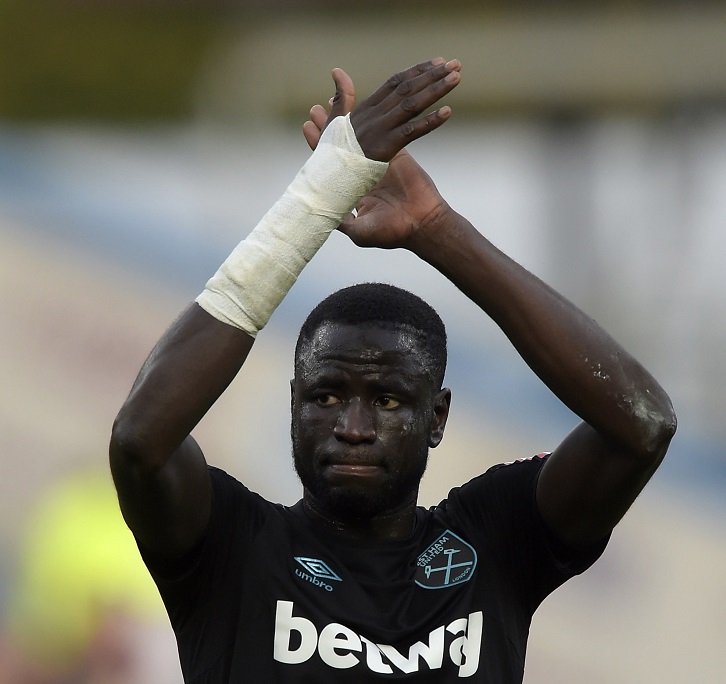 Cheikhou Kouyate applauds the fans at Burnley