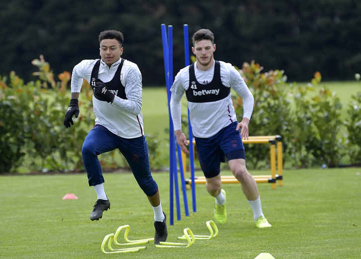 Declan Rice and Jesse Lingard warm up