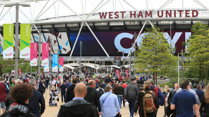 West Ham United supporters make their way to London Stadium