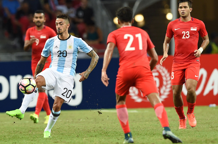 Lanzini in action against Singapore