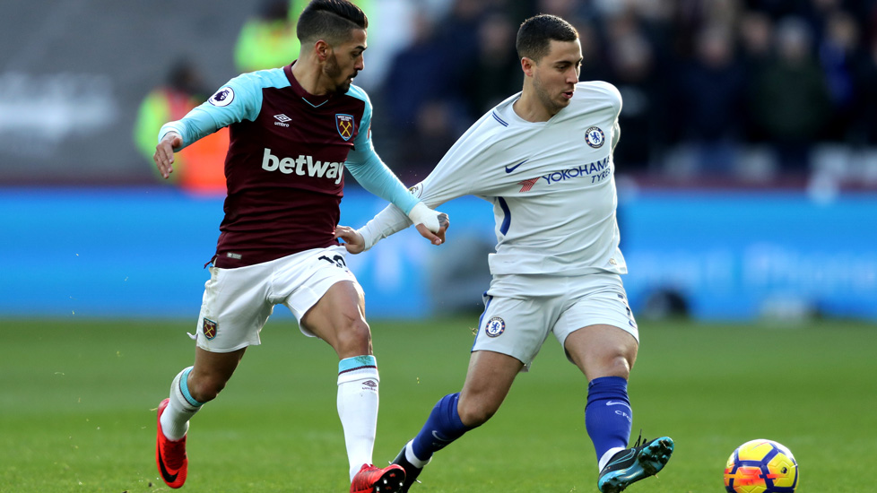 Manuel Lanzini challenges Eden Hazard