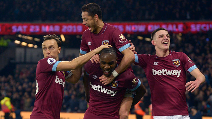 West Ham United players celebrate scoring against Liverpool on Monday