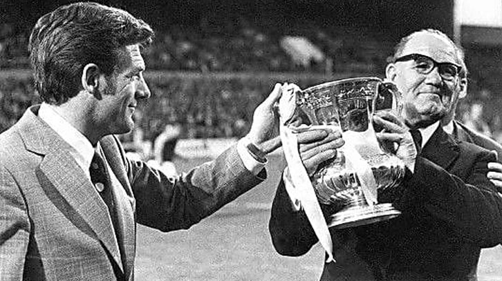 Wally St Pier holds the FA Cup aloft with John Lyall