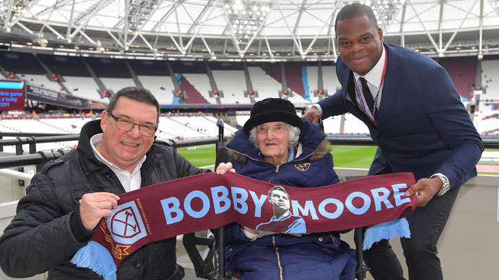 Mabel Arnold with her son Graham and Marlon Harewood at London Stadium