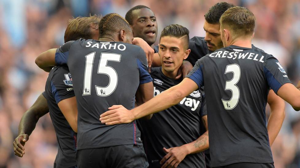West Ham players celebrate scoring at Manchester City