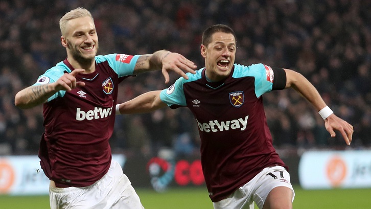 Chicharito and Marko Arnautovic celebrate the Austrian's goal against Watford