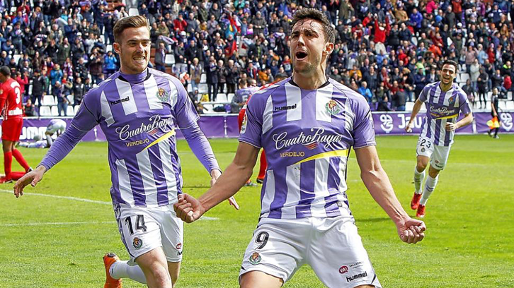 Toni Martinez celebrates a goal with Real Valladolid's leading scorer Jaime Mata