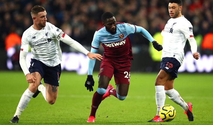 Arthur Masuaku in action against Liverpool