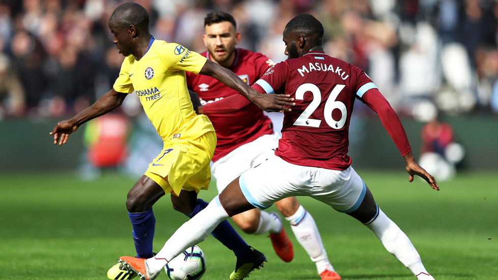 Arthur Masuaku makes a challenge against Chelsea