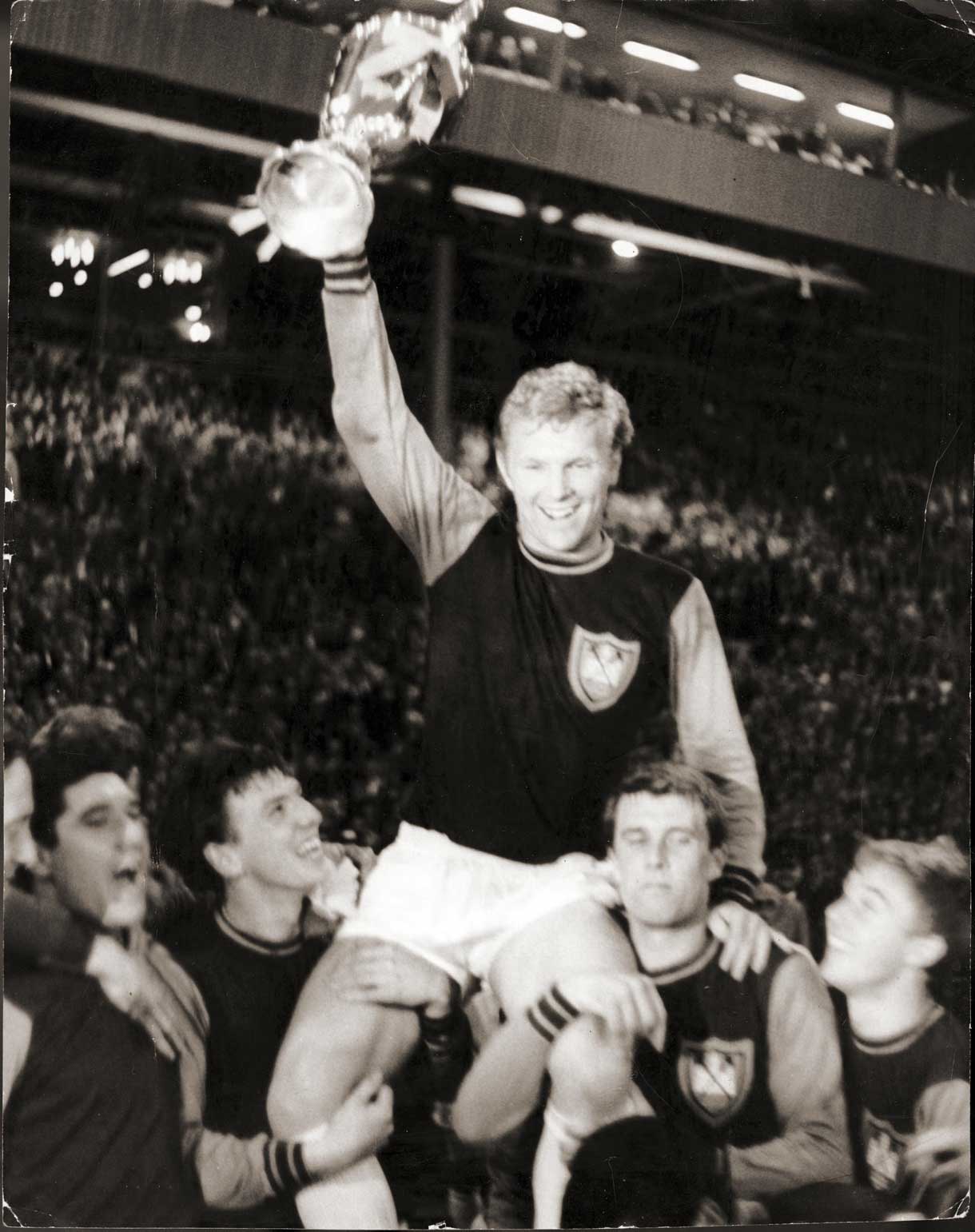 Bobby Moore holds the European Cup Winners' cup aloft