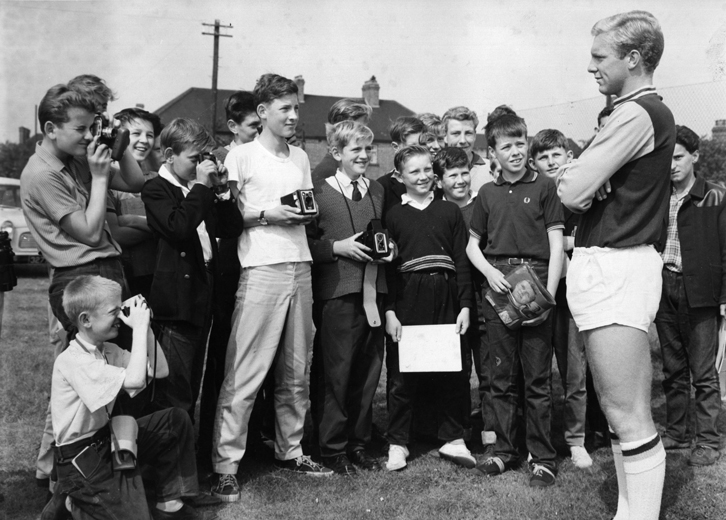 Bobby Moore with young fans