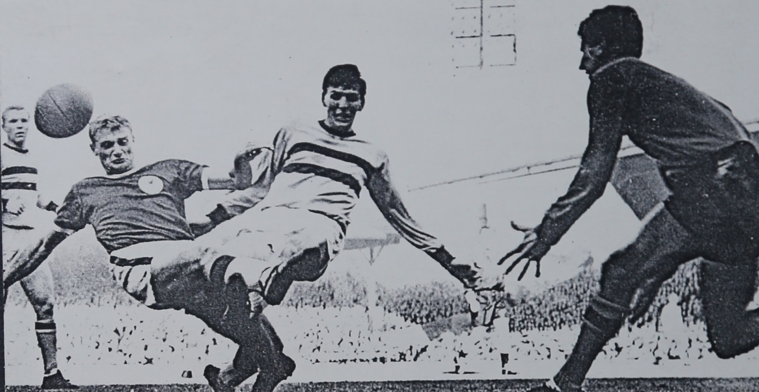 Dave Bickles makes a vital challenge to deny Roger Hunt