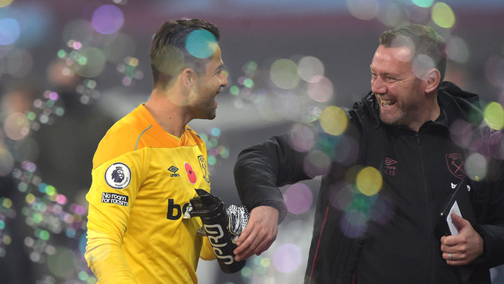 Kevin Nolan with Fabianski