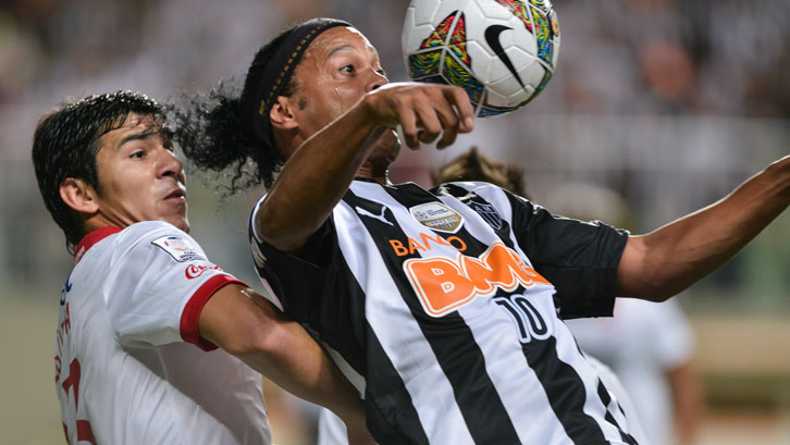 Facing Ronaldinho during his successful spell with Nacional