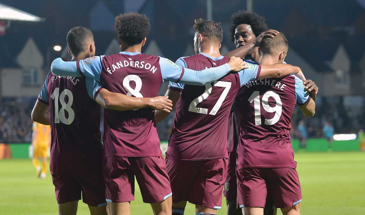 The Hammers celebrate Jack Wilshere's goal at Newport