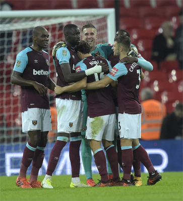 The Hammers celebrate Angelo Ogbonna's winner
